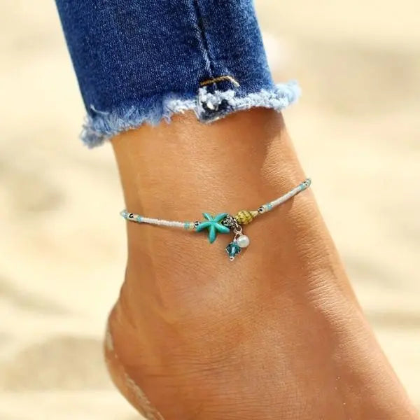Bracelet ornée d'étoiles, de coquillages et de pierres naturelles