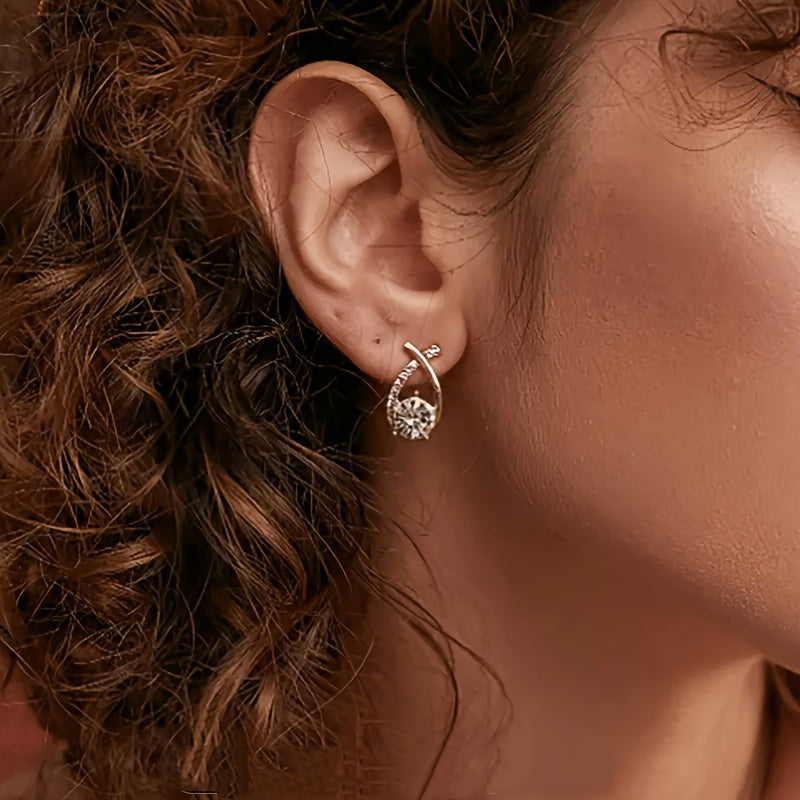 Boucles d'oreilles en or avec croix et zircon