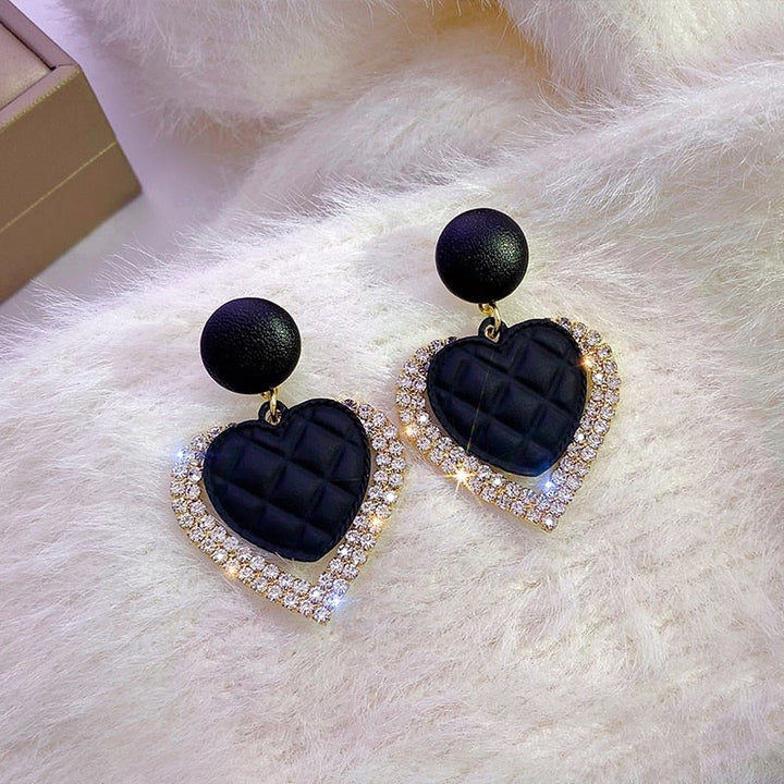 Boucles d'Oreilles en Or avec Cœur Noir