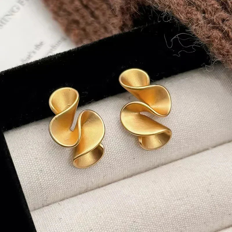 Boucles d'oreilles florales en argent et or 18K