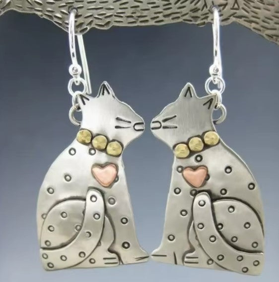Éblouissantes boucles d'oreilles en design de chat