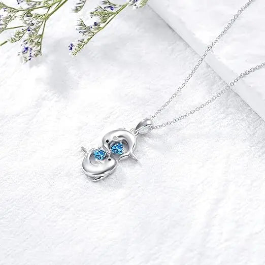 Collier en Argent avec Double Dauphins et Cristal Bleu