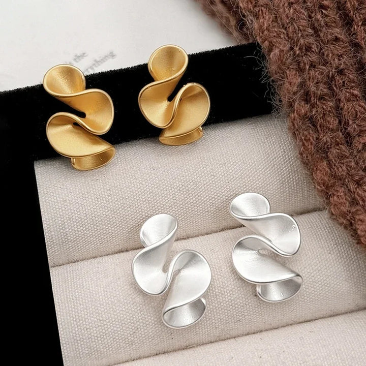 Boucles d'oreilles florales en argent et or 18K