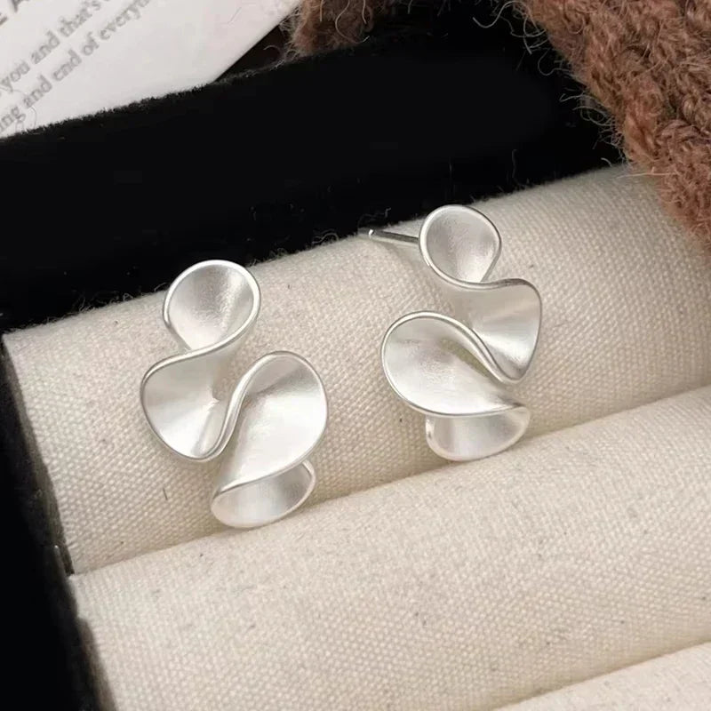 Boucles d'oreilles florales en argent et or 18K